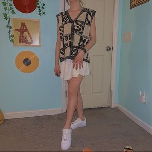 Vintage animal print patchwork sweater vest!